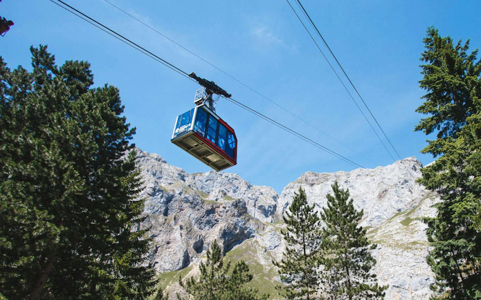 Cable car ascending Picos de Europa mountains in Cantabria, Spain.