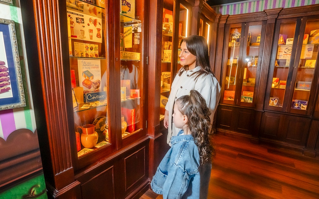 Guests viewing vintage Cadbury displays at Bourneville Experience, Cadbury World.
