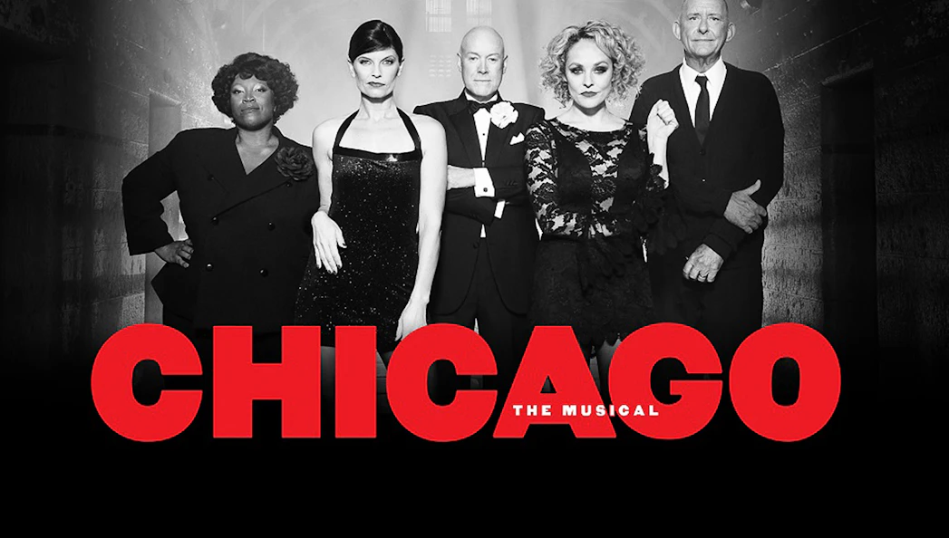 Cast of "Chicago: The Musical" in formal attire.