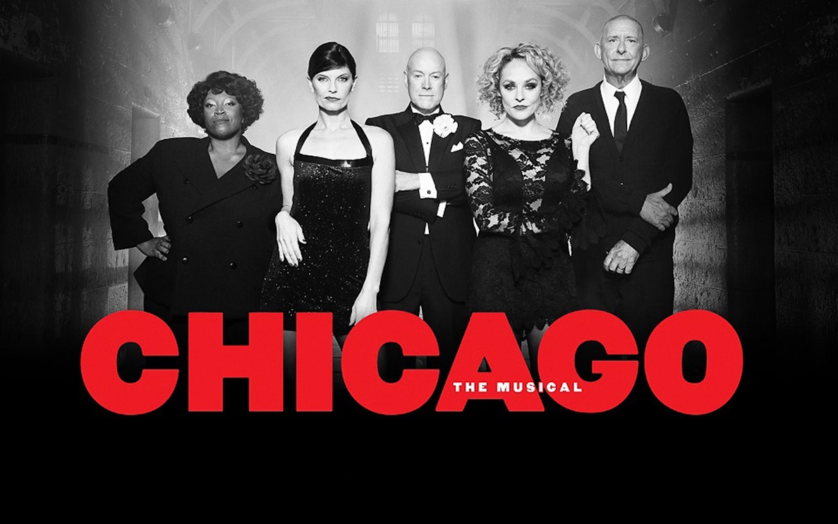Cast of "Chicago: The Musical" in formal attire.