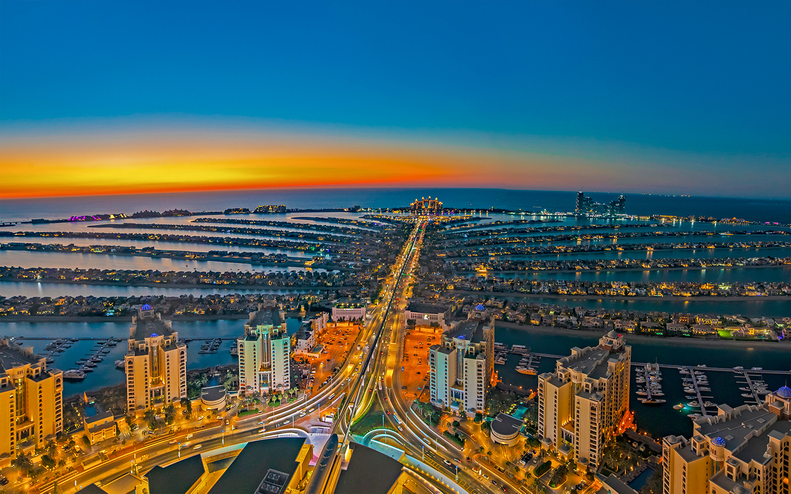 Aerial view of Palm Jumeirah at sunset, Dubai, seen from The View At The Palm.