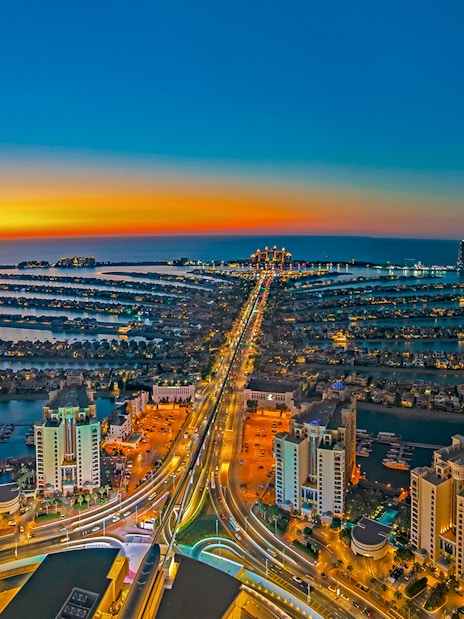 Aerial view of Palm Jumeirah at sunset, Dubai, seen from The View At The Palm.