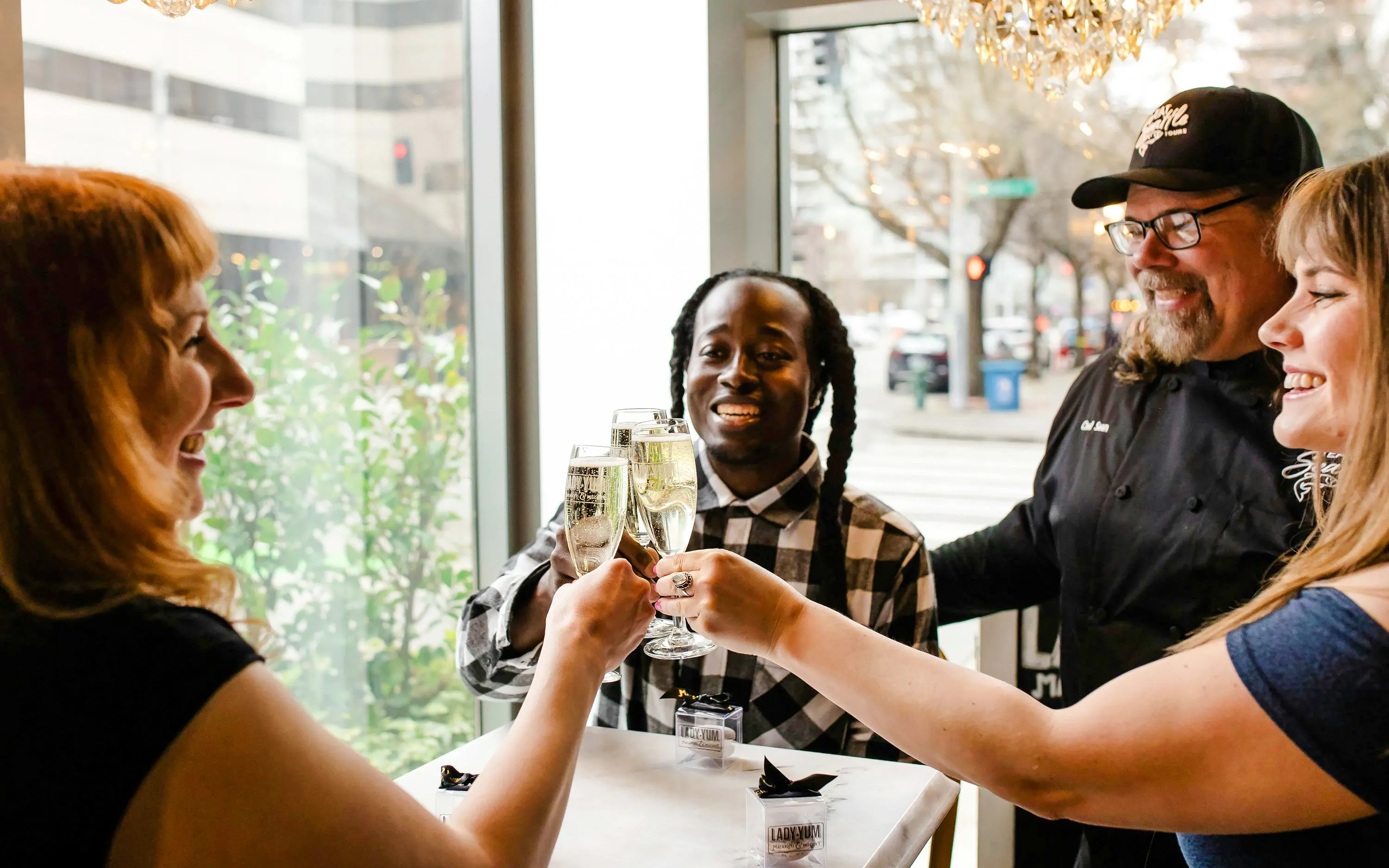 Group toasting with champagne during Seattle Happy Hour Tour.