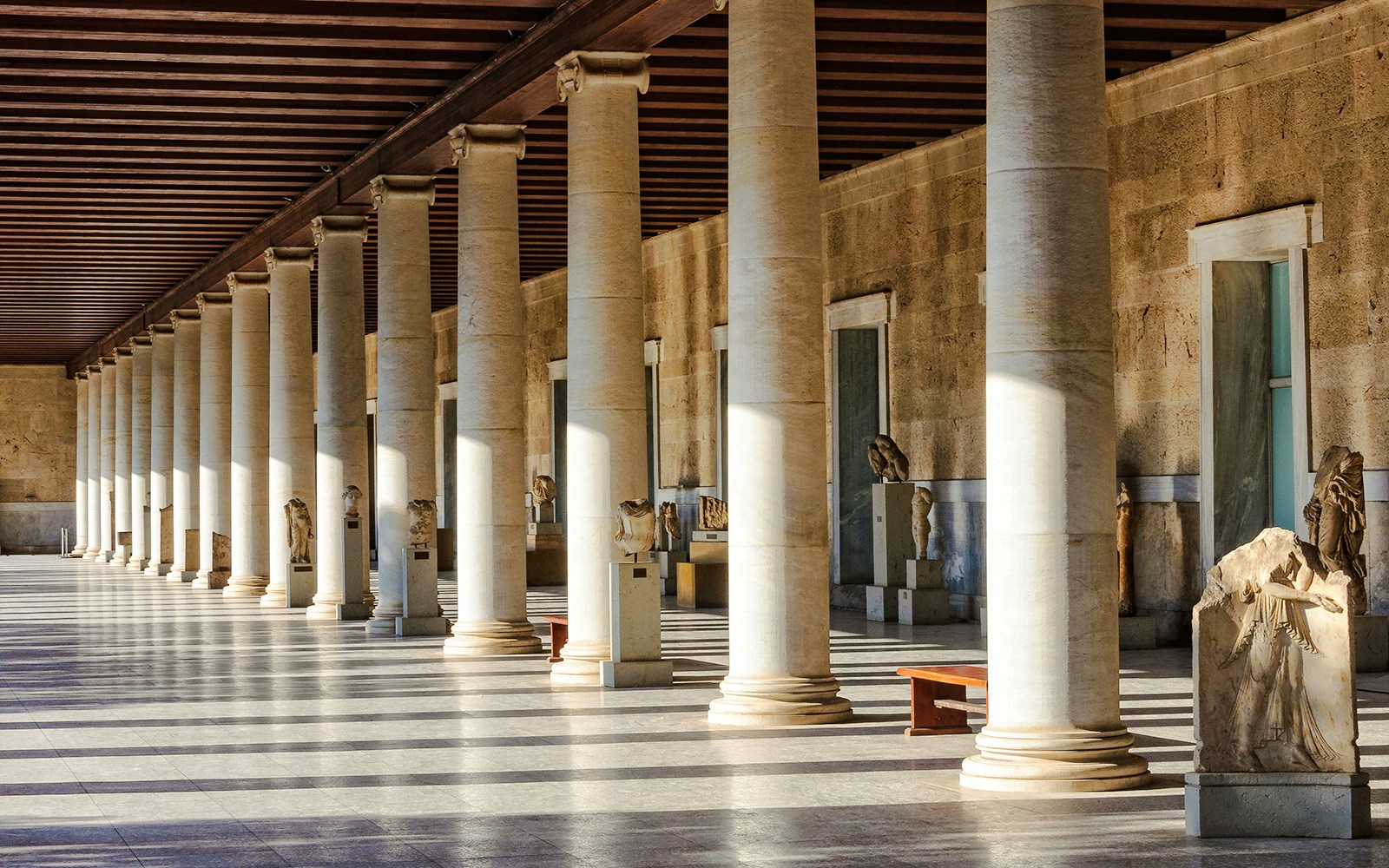 Columns and statues inside the Stoa of Attalos, Athens, Greece.