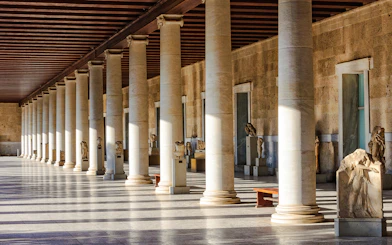 Columns and statues inside the Stoa of Attalos, Athens, Greece.