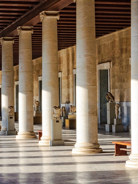 Columns and statues inside the Stoa of Attalos, Athens, Greece.