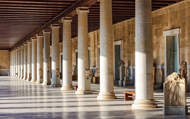 Columns and statues inside the Stoa of Attalos, Athens, Greece.
