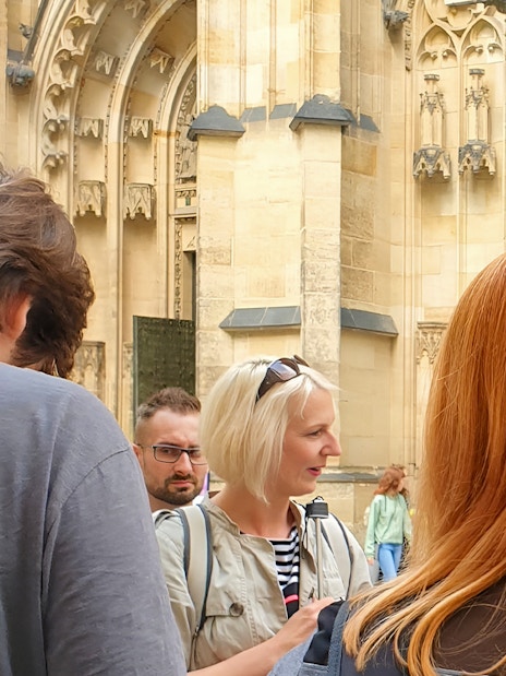 Tour group at Prague Castle entrance during guided tour.