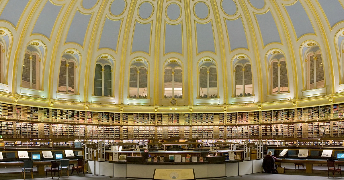 British Museum Reading Room with circular bookshelves and domed ceiling in London.