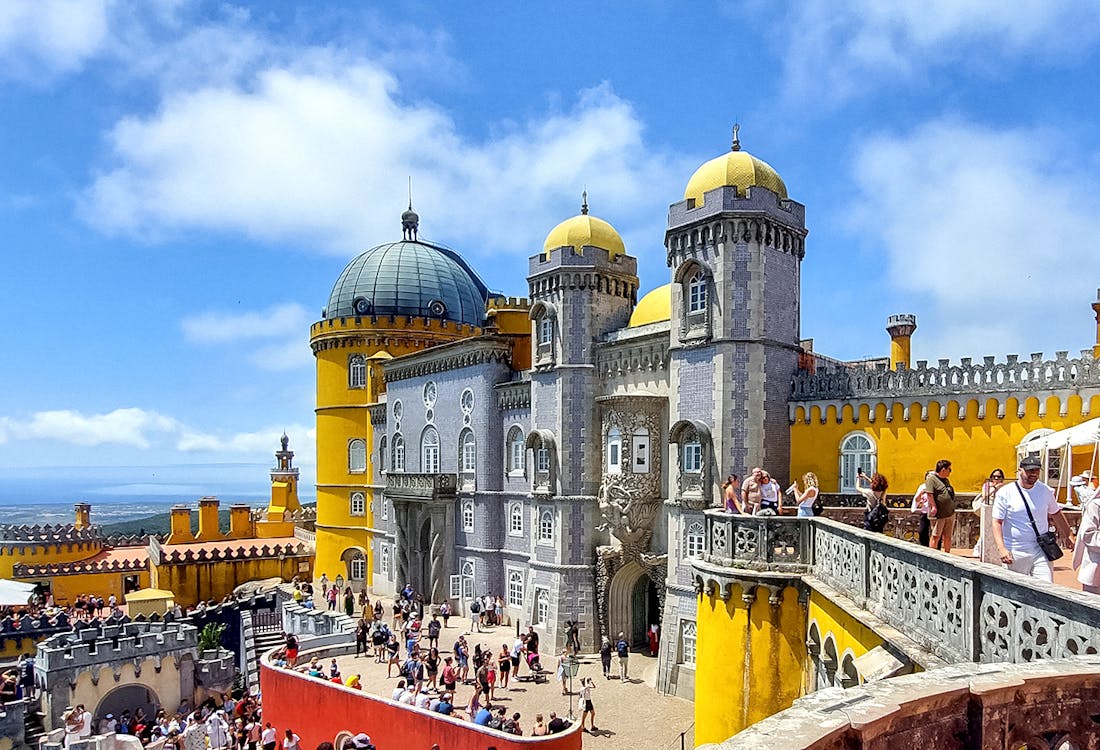 Pena Palace in Sintra with vibrant colors and unique architecture on a guided tour.