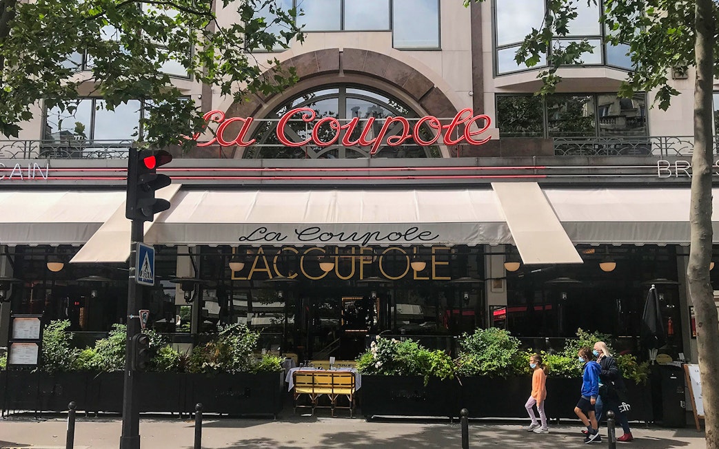 La Coupole restaurant facade on Montparnasse Walking Tour, Paris.