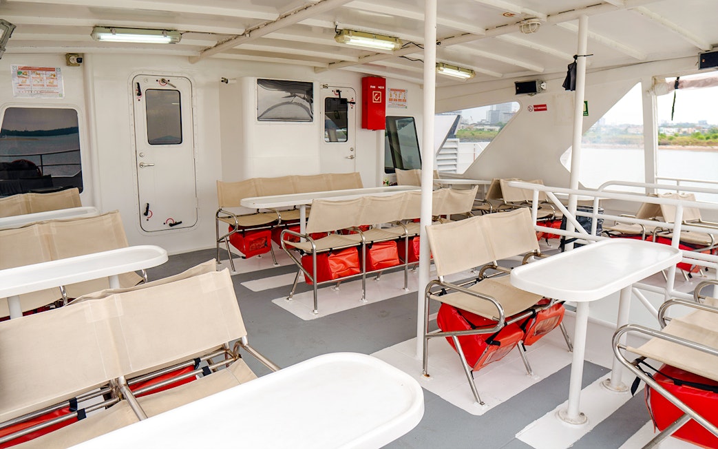 Ferry deck seating area on Singapore to Batam route.