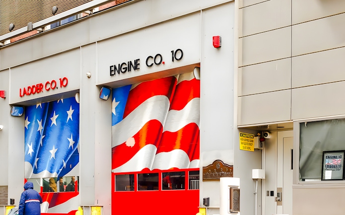 FDNY Ten House with American flag mural on garage doors, New York City.