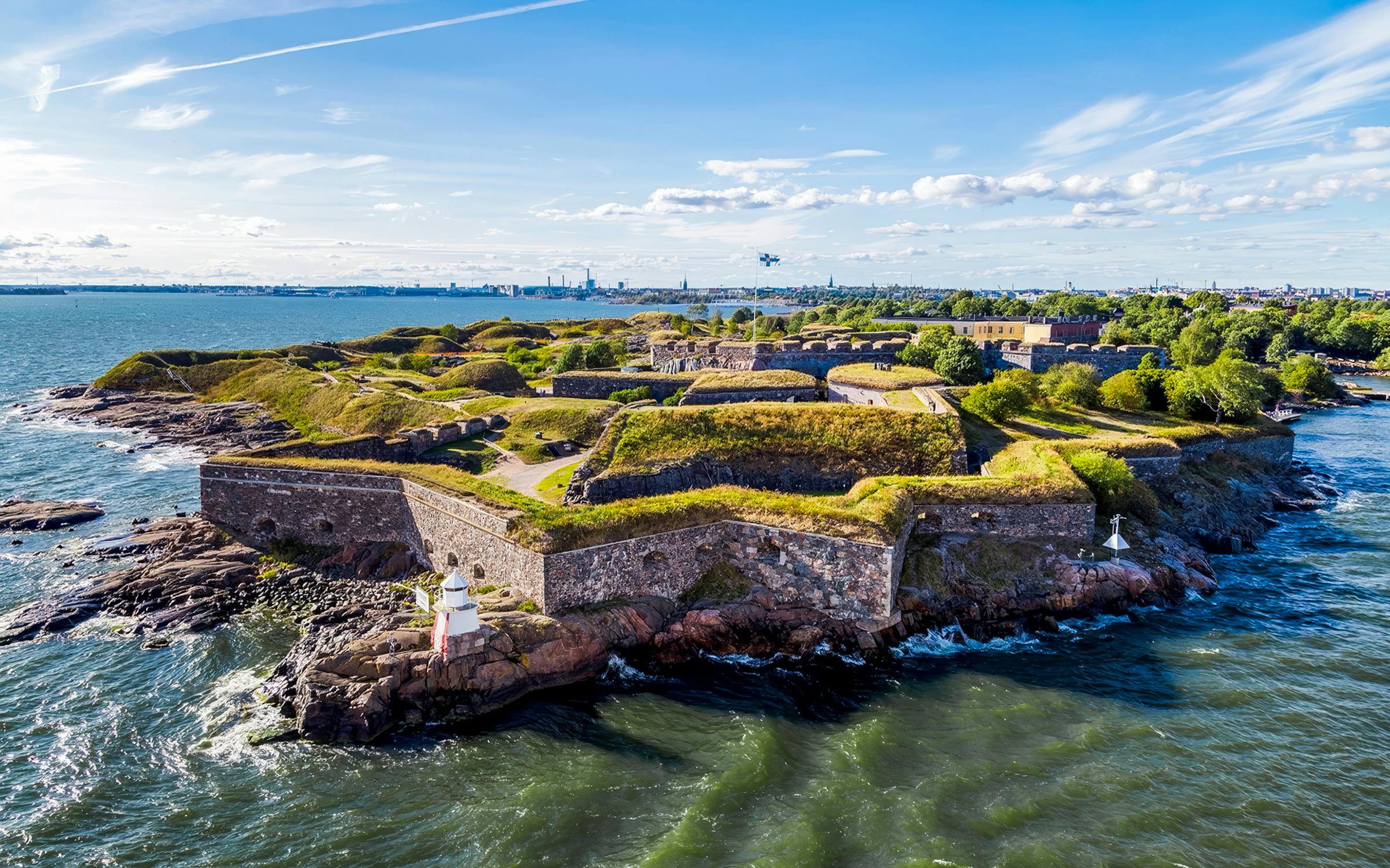 Suomenlinna sea fortress on an island in Helsinki, Finland, surrounded by water.