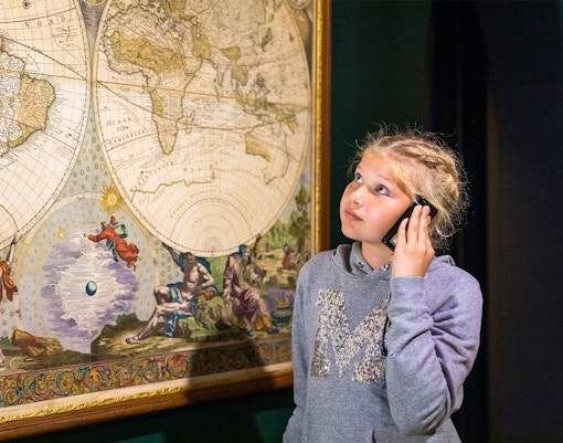 Maps exhibit at The National Maritime Museum showcasing historical maritime navigation tools.