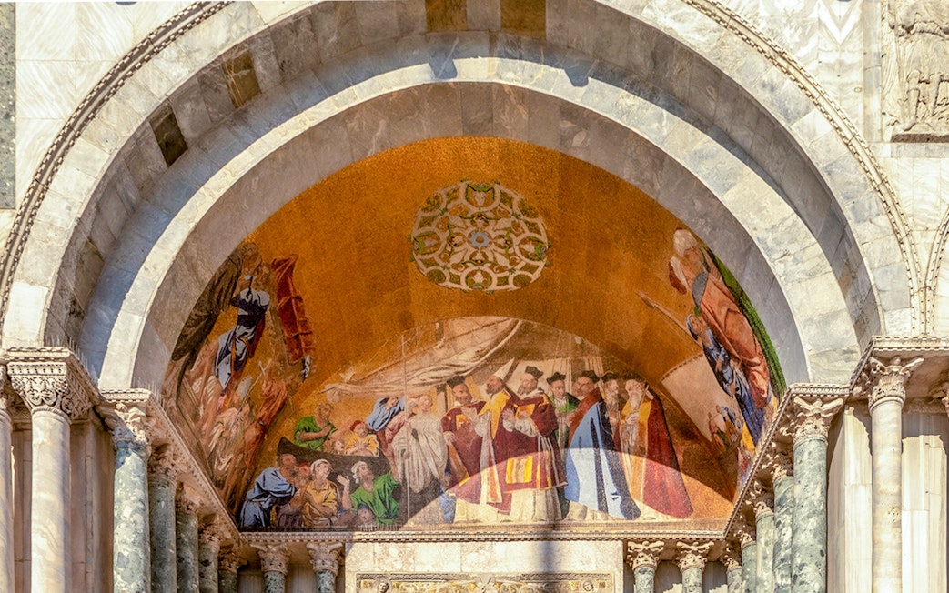 Mosaic detail above entrance of St. Mark's Basilica, Venice, Italy.