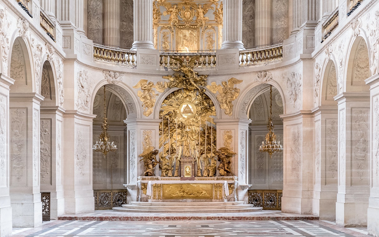 Royal Chapel altar with ornate gold detailing in Versailles Palace, France.