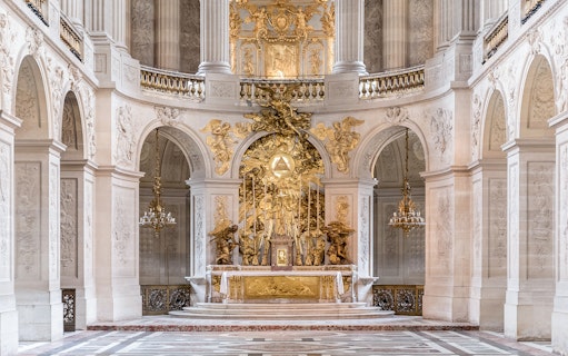 Royal Chapel altar with ornate gold detailing in Versailles Palace, France.