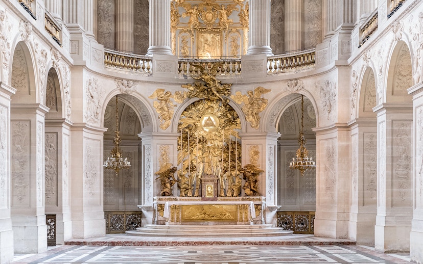 Royal Chapel altar with ornate gold detailing in Versailles Palace, France.