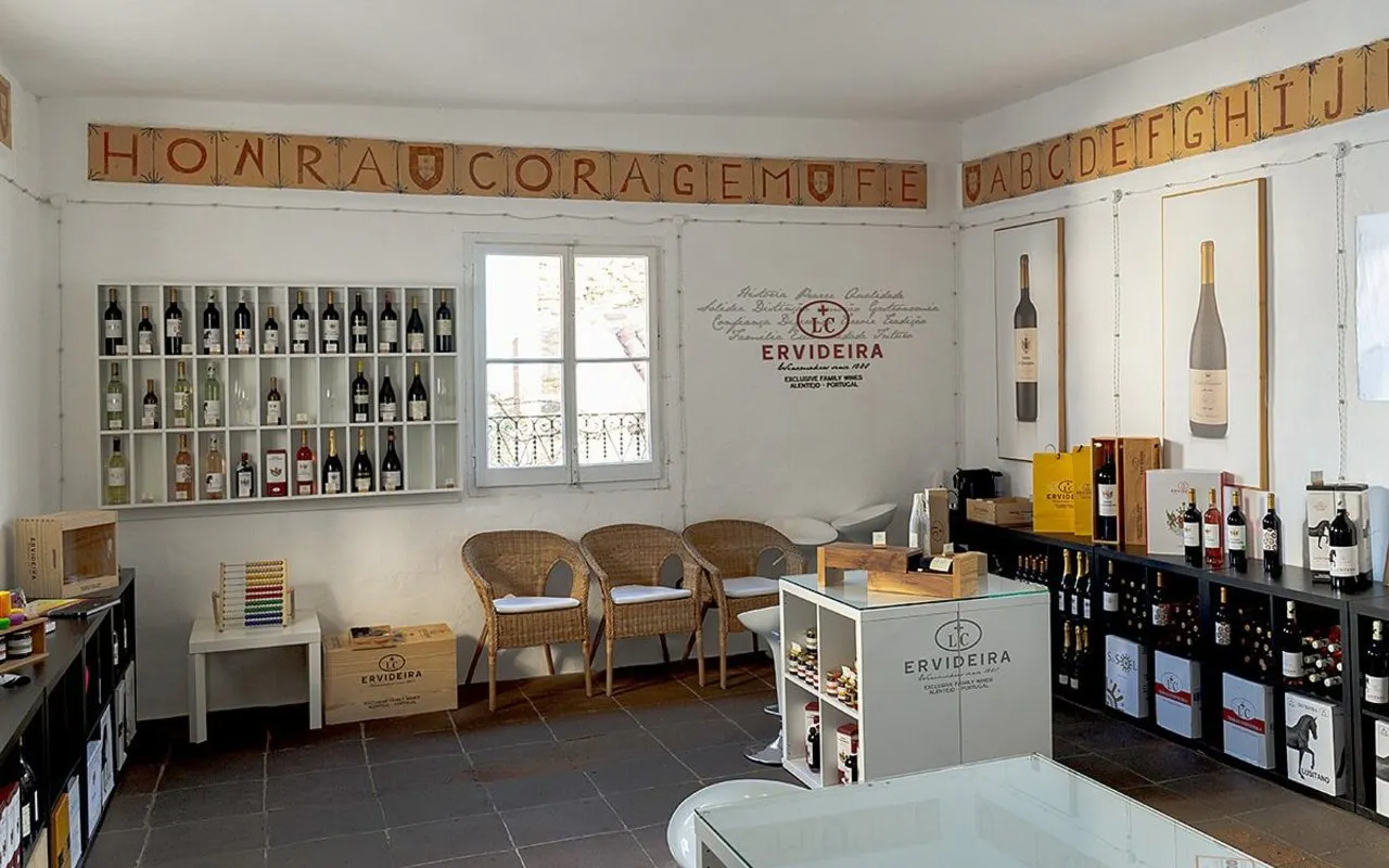 Ervideira Wine Shop interior with wine bottles on display in Monsaraz, Portugal.