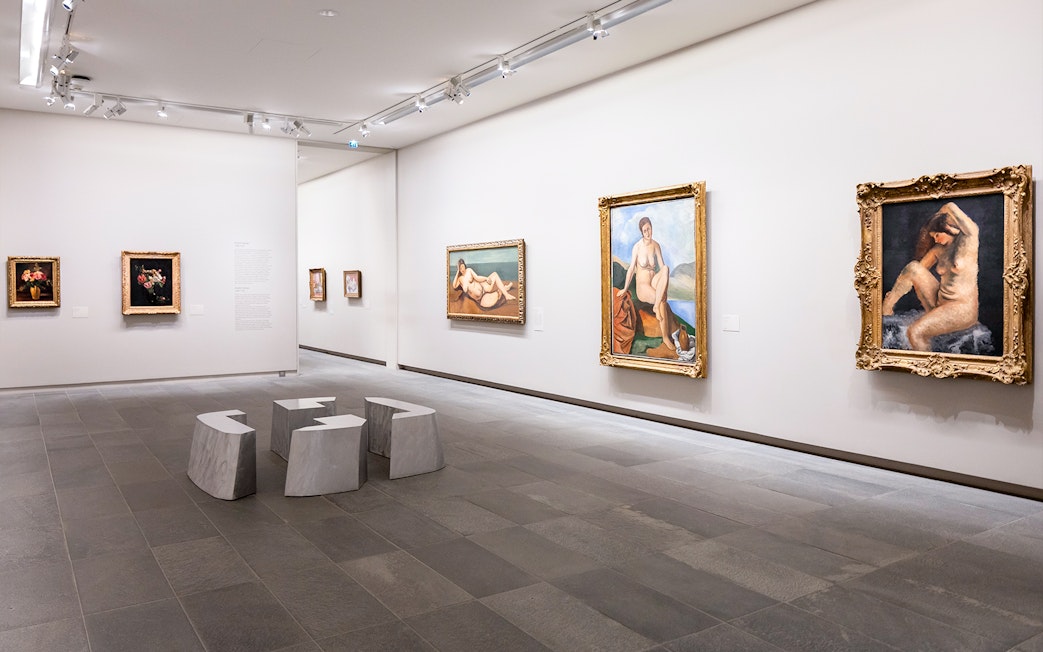 Artworks displayed inside Orangerie Museum, Paris, featuring classic paintings.