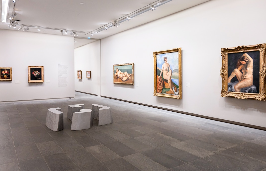 Artworks displayed inside Orangerie Museum, Paris, featuring Impressionist paintings.