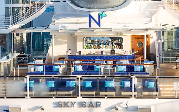 Sky Bar on Anthem of the Seas cruise ship with seating and bar area.