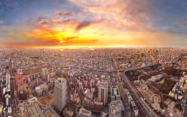 Aerial view of Osaka cityscape at sunset from Harukas 300 Observatory.