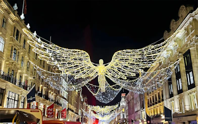 London Christmas lights display with angel decorations on Regent Street.