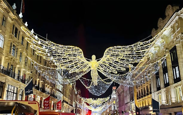 London Christmas lights display with angel decorations on Regent Street.