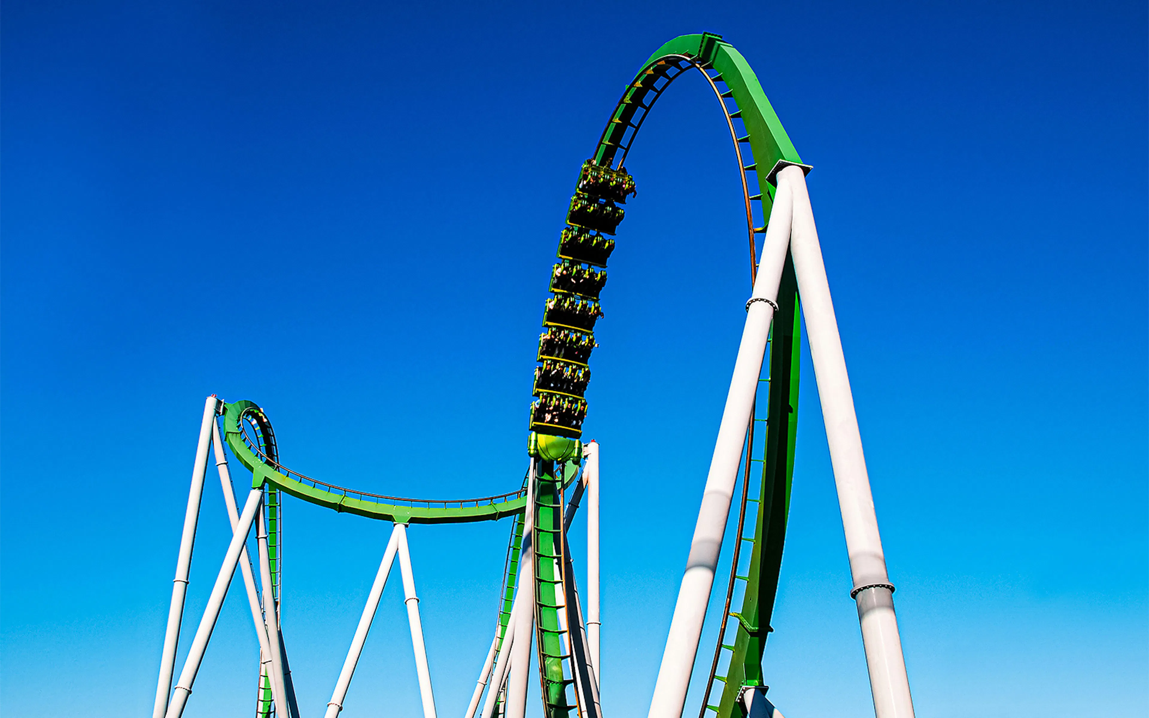 The Incredible Hulk Coaster at Islands of Adventure, Universal Studios Orlando, with green track and loops.