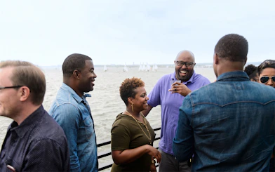 Guests enjoying the Premier Bottomless Mimosa Brunch Cruise on deck in Washington DC.