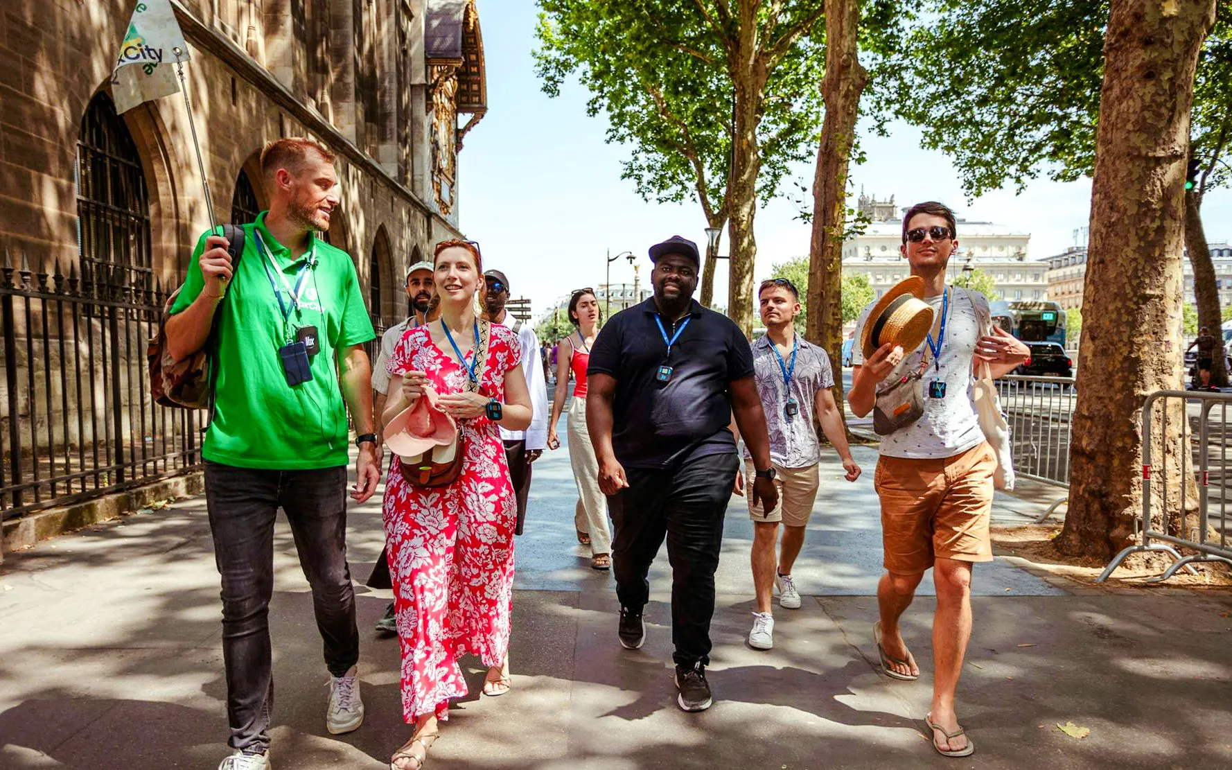 Tour group walking near Sainte-Chapelle in Paris during a guided tour.