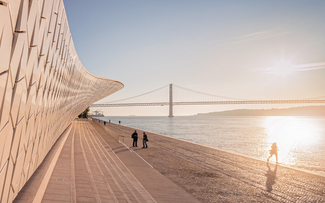 MAAT building by the Tagus River with bridge in Lisbon.