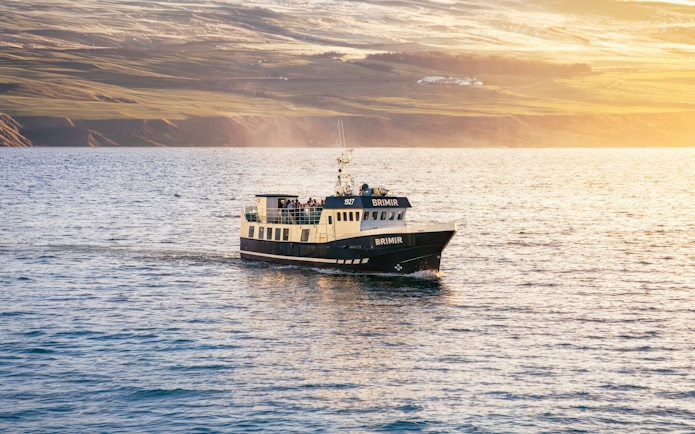 Whale watching boat on Eyjafjörður near Hjalteyri, Iceland.