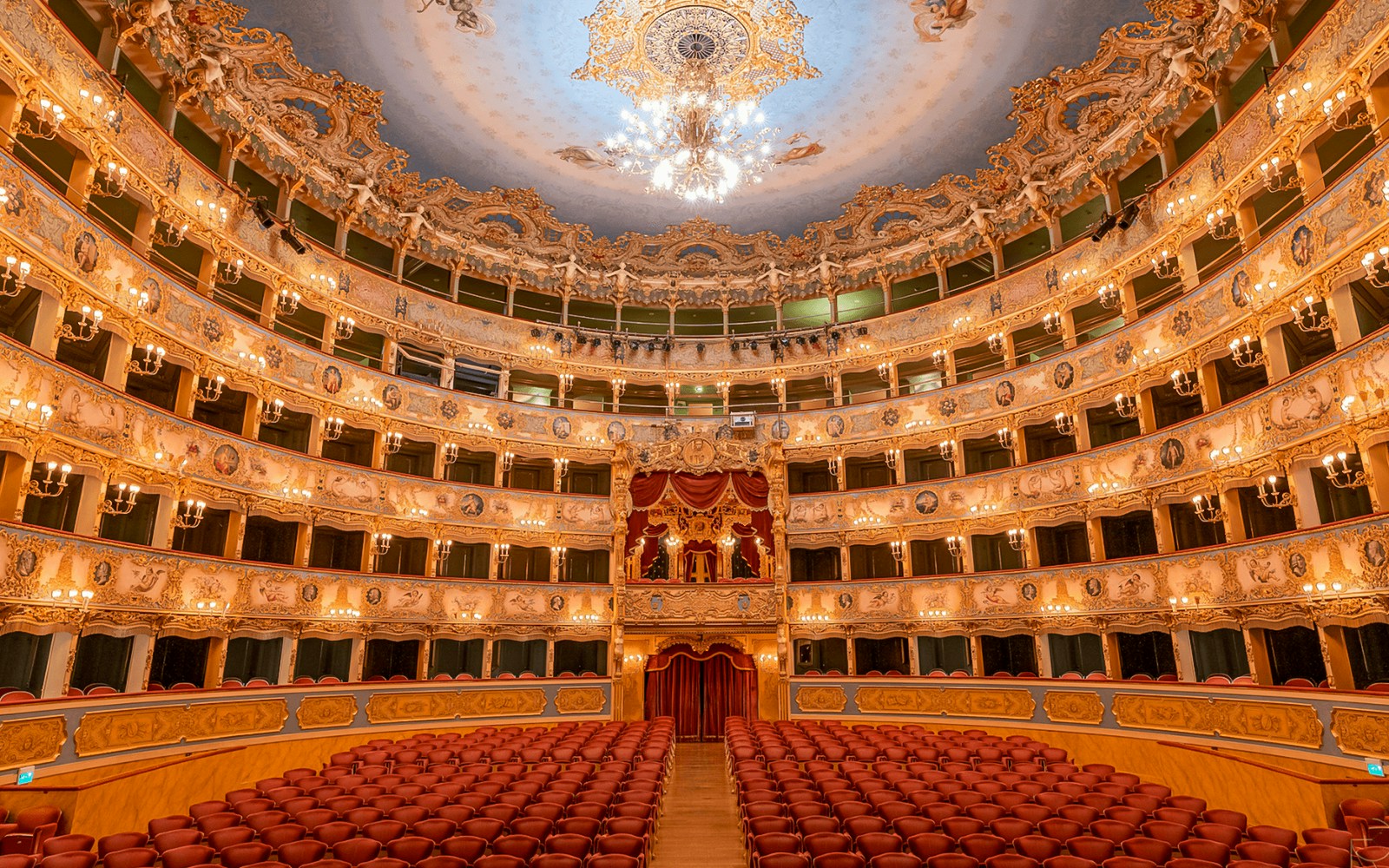 Teatro La Fenice interior with ornate balconies and stage, Venice, skip-the-line audioguide tour.