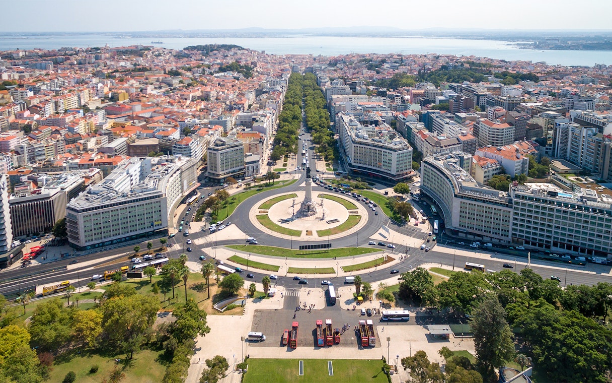 Aerial view of Lisbon's Marquês de Pombal Square with surrounding cityscape, part of Lisbon & Belém tour.