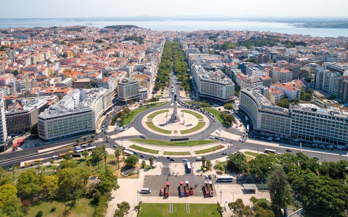 Aerial view of Lisbon's Marquês de Pombal Square with surrounding cityscape, part of Lisbon & Belém tour.