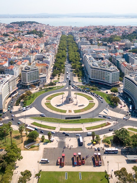 Aerial view of Lisbon's Marquês de Pombal Square with surrounding cityscape, part of Lisbon & Belém tour.