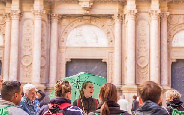 Tour group at Montserrat Monastery entrance, Spain.