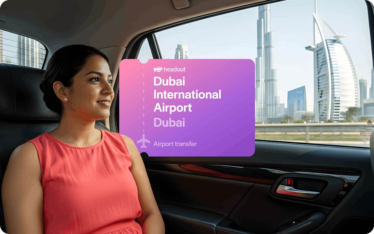 Passenger in car with view of Burj Khalifa and Burj Al Arab, Dubai airport transfer.