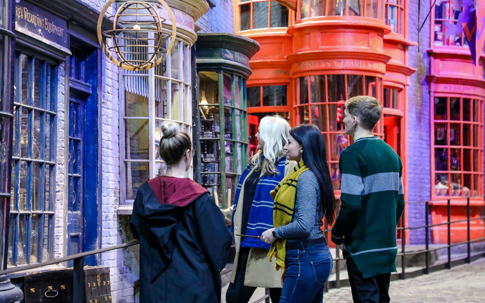 Visitors exploring Diagon Alley during a small group guided tour of Harry Potter in London.