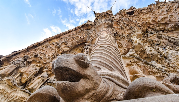 Carved turtle statue at Sagrada Familia, Barcelona facade.