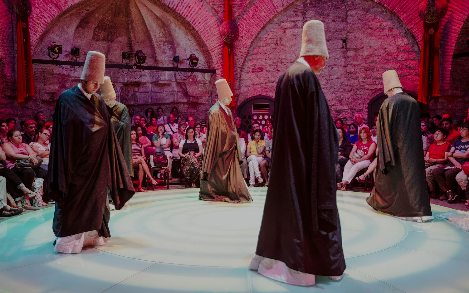 Whirling dervishes performing at Hodjapasha Cultural Center in Istanbul.
