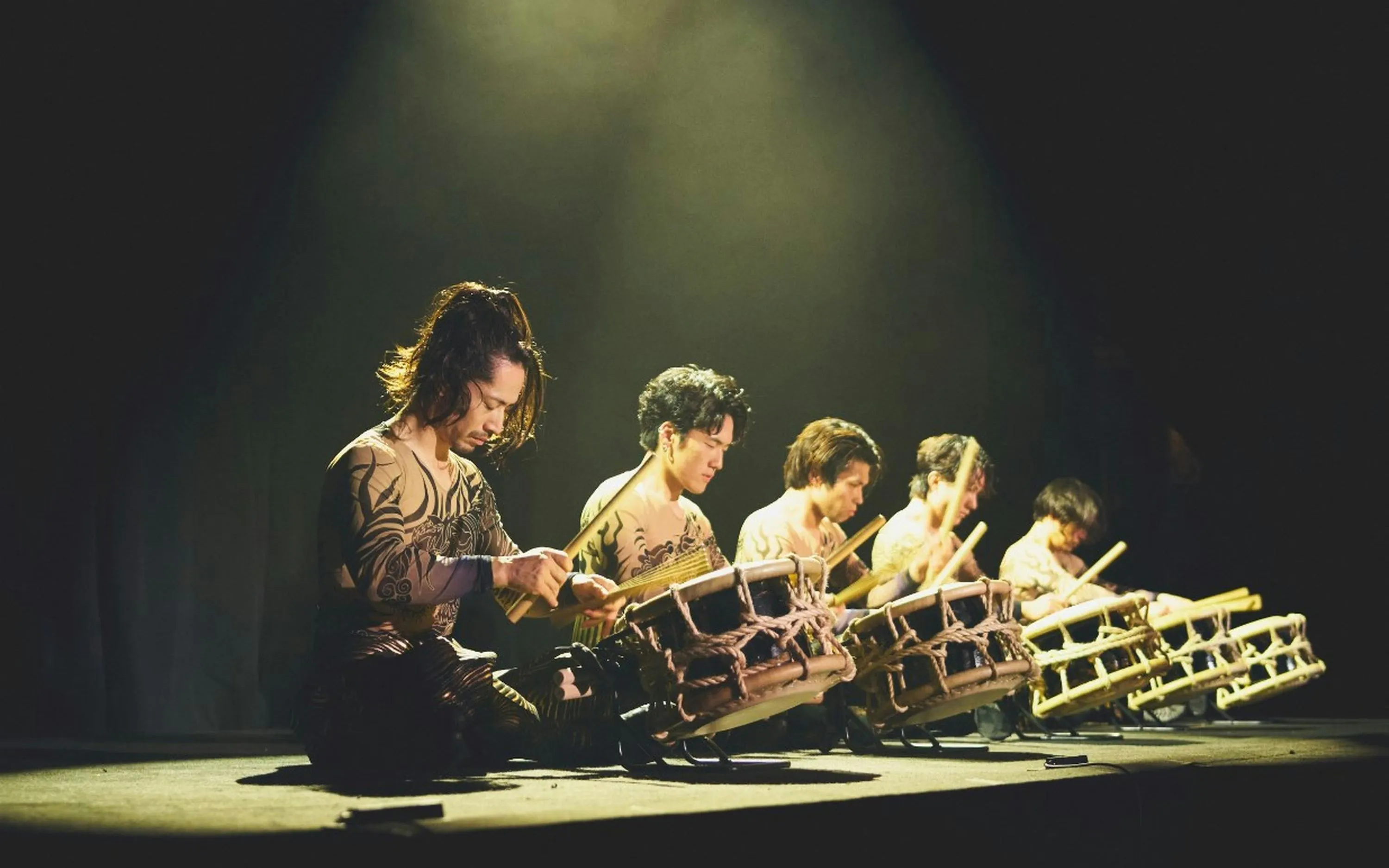 Performers playing traditional drums at DRUM TAO Theater in Kyoto.
