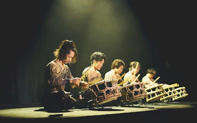 Performers playing traditional drums at DRUM TAO Theater in Kyoto.