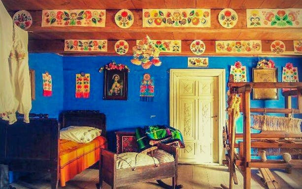 Traditional Polish room with folk art decor in Masovian countryside.