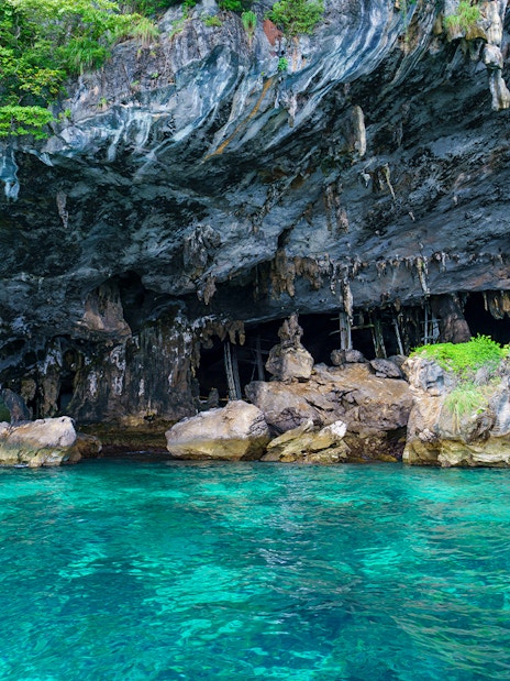 Viking Cave with turquoise water at Maya Bay, Phi Phi Island, Thailand.