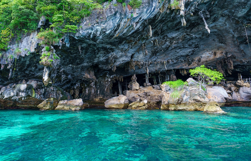 Viking Cave on Maya Bay Island, Phi Phi Island, Thailand, showcasing limestone formations.