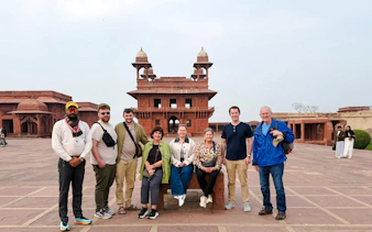 Group of tourists at Agra Fort during a 2-day private trip from Delhi.